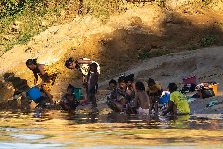 Women and children on the banks of the Tsiribihina River, Western Madagascar