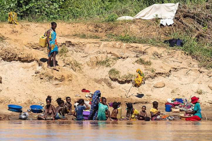 Women and children on the banks of the Tsiribihina River, Western Madagascar