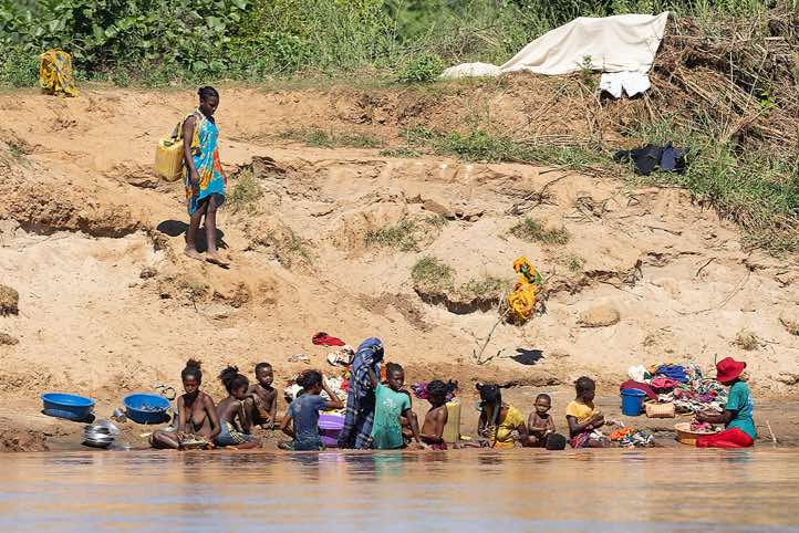 Women and children on the banks of the Tsiribihina River, Western Madagascar
