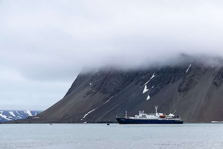 Expedition vessel Plancius in the waters of Faksevågen, Lomfjorden