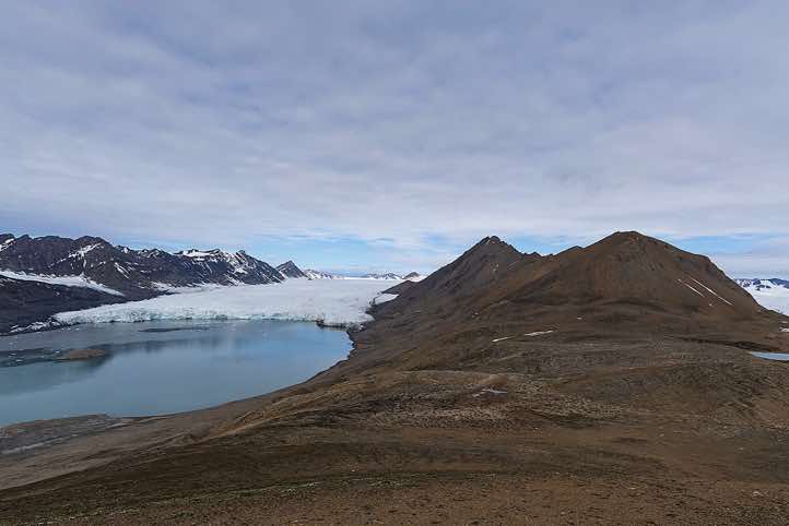 View from the top of a mountain ridge between two glaciers, Valentinryggen, St. Jonsfjorden
