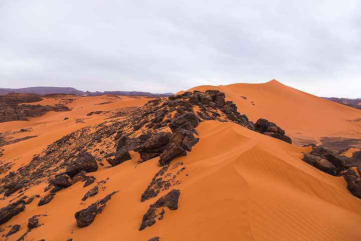 Sand dunes and rocks, Tadrart region, Tassili n ́Ajjer National Park, Sahara, North Africa