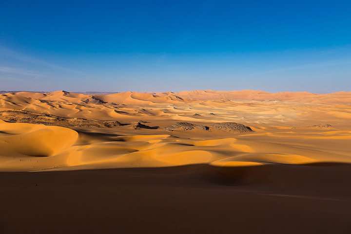 Sand dunes in different colours, southern Oued In Tehak, Tadrart region, Tassili n ́Ajjer National Park, Sahara, North Africa