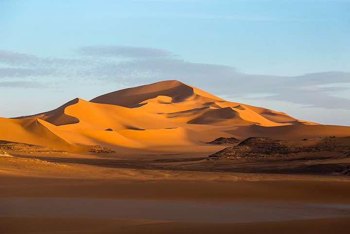 Sand dunes and claypan, southern Oued In Tehak, Tadrart region, Tassili n ́Ajjer National Park, Sahara, North Africa