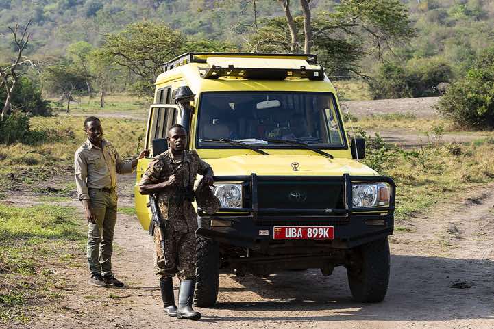 Local tour guide Essy (left), wildlife guide and driver Engola, Lake Mburo National Park